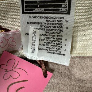 NEW, AS IS WITH TAGS BEIGE, LONG, COTTON SCARF , FLOWER APPLIQUES AND FRINGE